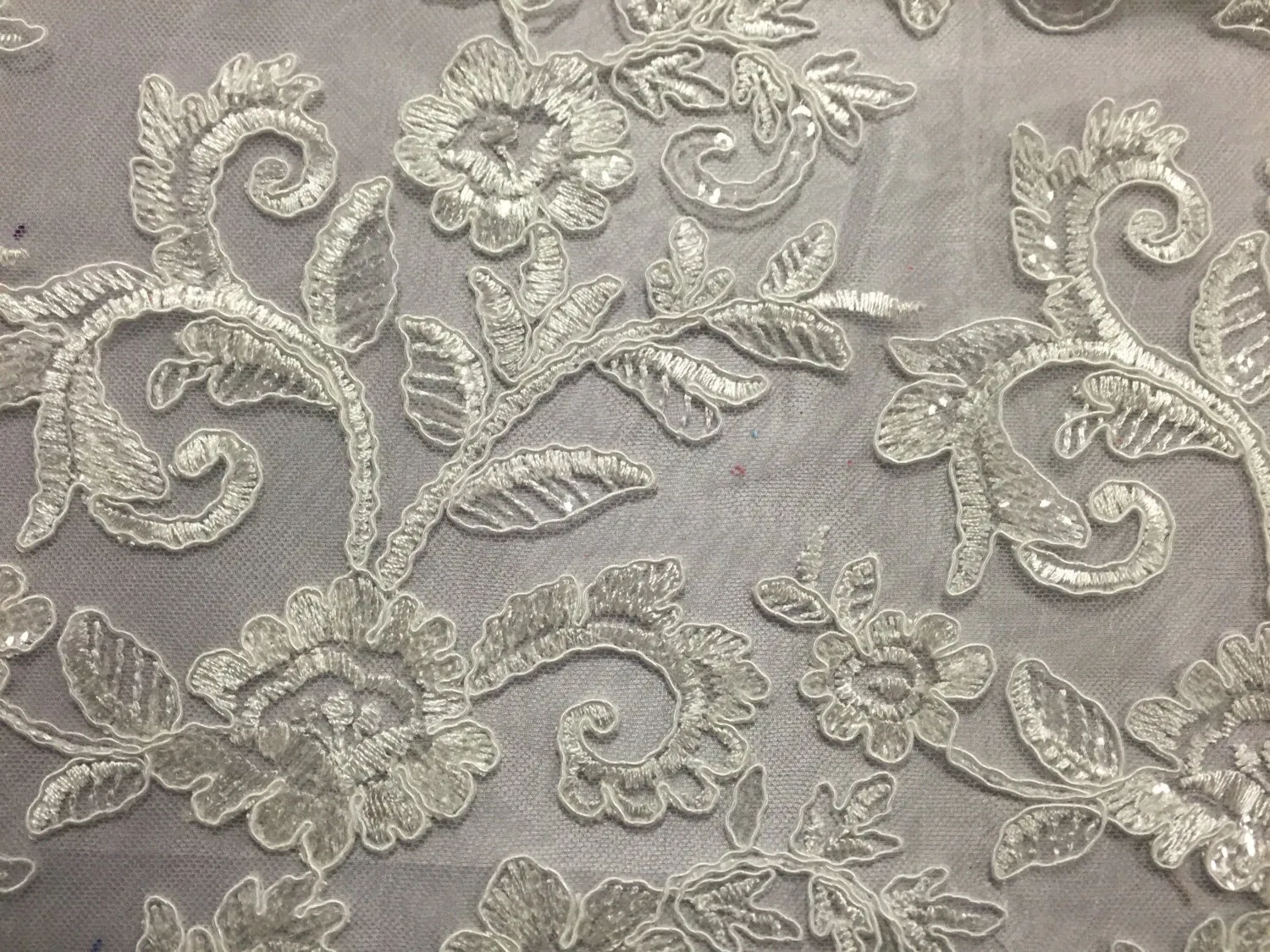 Ivory corded flowers embroider with sequins on a mesh lace fabric-wedding-bridal-prom-nightgown-dresses-fashion-sold by the yard-