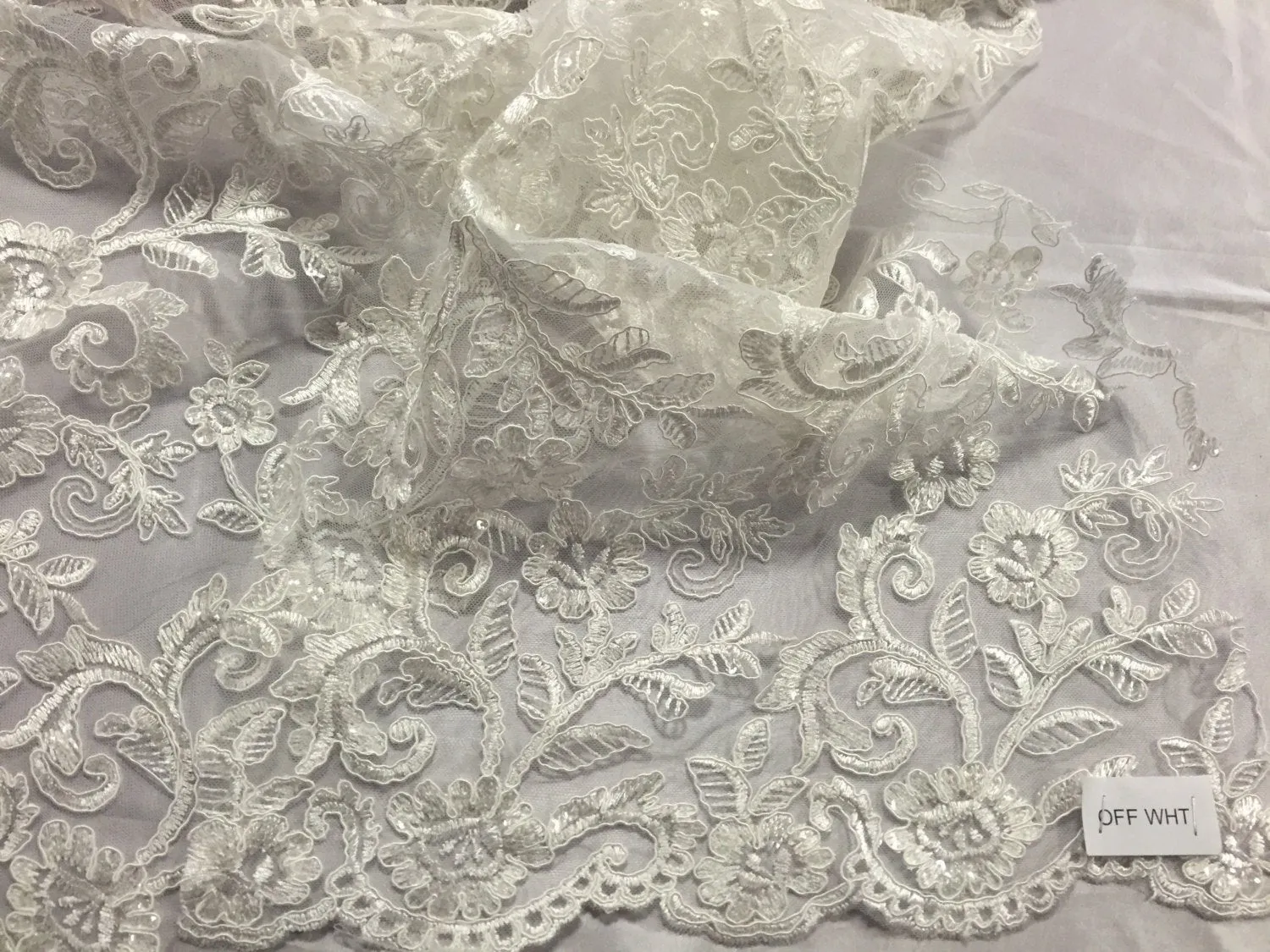 Ivory corded flowers embroider with sequins on a mesh lace fabric-wedding-bridal-prom-nightgown-dresses-fashion-sold by the yard-