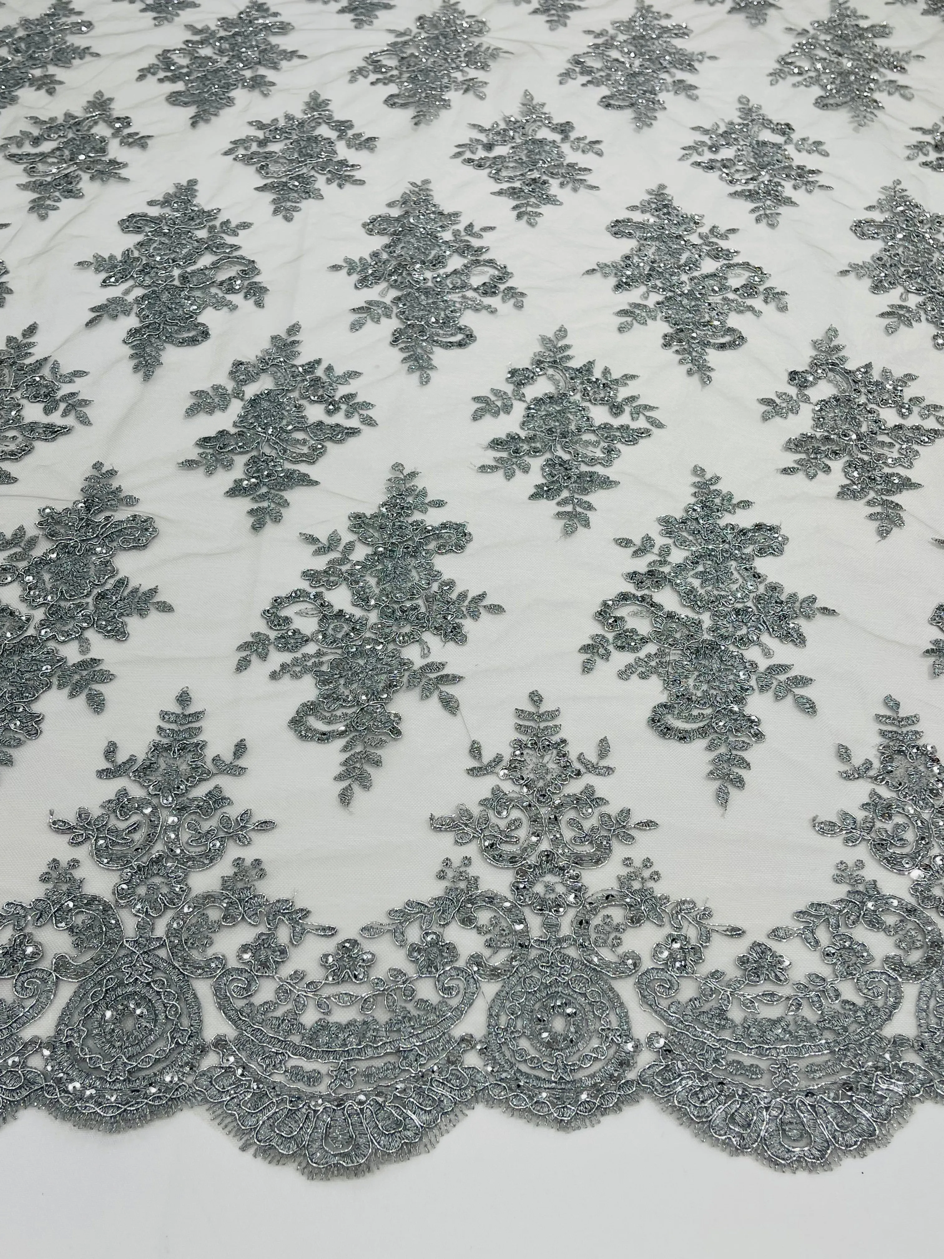 Modern Floral embroider with sequins on a mesh lace fabric-sold by the yard.